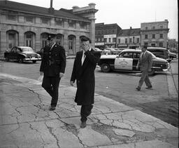 Police with Man at Market Square - V25.5-15-34
