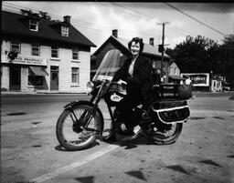 Female Motorcyclist at Victoria Street and Princess Street - V25.5-36-7.3 C