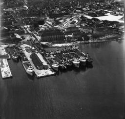 C.S.L. Dock (now Wolfe Islander Dock) next to Fort Frontenac near the Causeway.  Winter shot. - V25.6-1-13-5