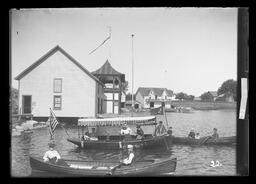 [The Clarence, Two Row Boats and Eleven People on the Water Carleton Island, N.Y., U.S.A.]