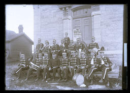 [Wolfe Island Band Sitting With Instruments]