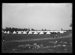 [Military Camp of Pitched Tents with Three Boys in Foreground (possibly RCHA)]