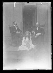 [Two Men and a Girl on a Porch]
