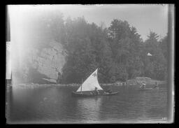 [Canoe With a Sail and Another Canoe]
